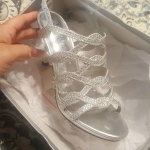 Heels worn once for about 4 hours.